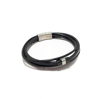 FOUR STRAND BLACK LEATHER BRACELET WITH FLAT STAINLESS STEEL BEADS