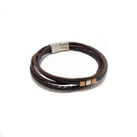 FOUR STRAND BROWN LEATHER BRACELET WITH FLAT STAINLESS STEEL BEADS