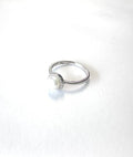 STERLING SILVER FRESHWATER PEARL RING WITH CZ HALO